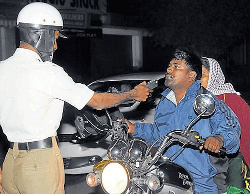 In an attempt to create awareness on road safety standards and put an end to drunk driving, the City traffic police organised special drives at 97 places on Saturday and Sunday night. File photo -DH