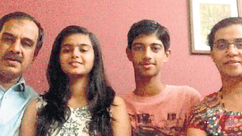 Proud moment: Megha with father Balachandra, mother Mamatha and brother Aditya.