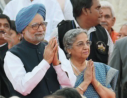 Outgoing Prime Minister Manmohan Singh and his wife Gursharan Kaur at the swearing-in ceremony of the NDA government at Rashtrapati Bhavan in New Delhi on Monday. PTI Photo