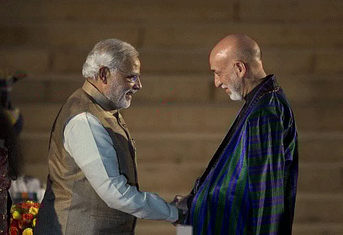 All the leaders, who were here to attend Modi's swearing-in ceremony, gathered at the reception hosted by Mukherjee at Rashtrapati Bhawan. AP photo