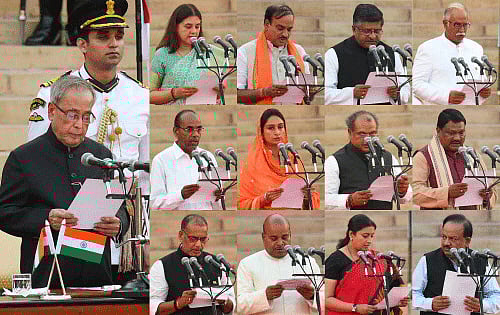 President Pranab Mukherjee administers oath to Cabinet Ministers Maneka Sanjay Gandhi, Ananthkumar, Ravi Shankar Prasad, Ashok Gajapathi Raju Pusapati, Anant Geete, Harsimrat Kaur Badal, Narendra Singh Tomar, Jual Oram, Raja Mohan Singh, Thaawar Chand Gehlot, Smriti Irani and Harshwardhan at the swearing-in ceremony at Rashtrapati Bhavan in New Delhi on Monday. PTI Photo