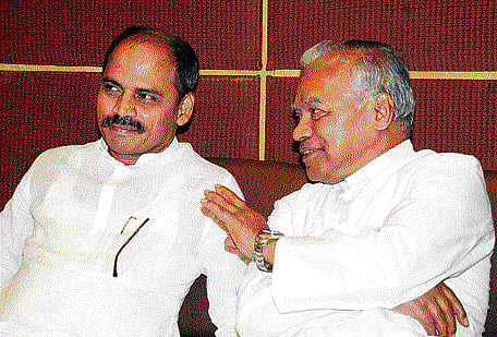 Medical Education Minister Sharanprakash Patil and Dr Lawrence D'Souza, Director of St John's National Academy of Health Sciences, at the final investigators' meet of ICRAG at St John's Medical College and Research Institute in Bangalore on Friday. dh Photo