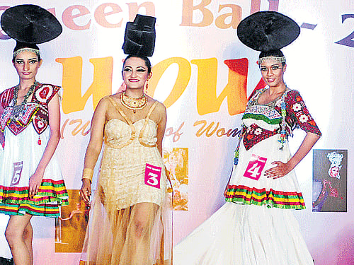 Models walk the ramp in colourful designs. DHNS