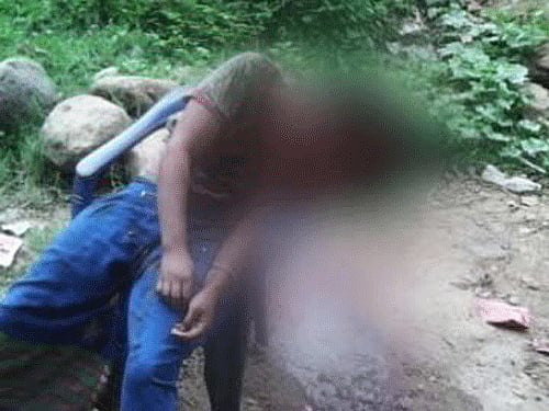 The Garo militants shot dead a 35-year-old tribal woman, a mother of four, with an assault rifle splitting her head in two claiming her to be a police informer after she resisted their attempts at molestation and rape in Raja Rongat village on June three. Screen grab