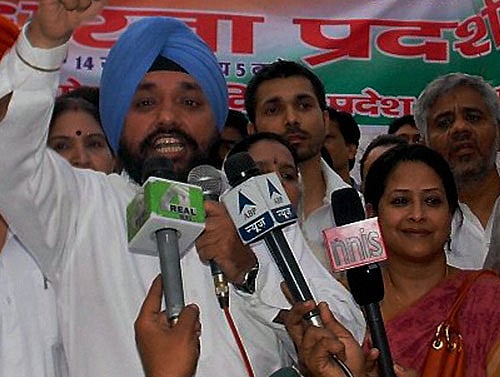 DPCC chief Arvinder Singh  with Sharmistha Mukherjee during the protest. PTI