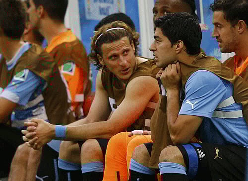The Uruguay bench, including Luis Suarez reacts after conceding a goal to Costa Rica during their 2014 World Cup Group D soccer match at the Castelao stadium in Fortaleza. Reuters photo