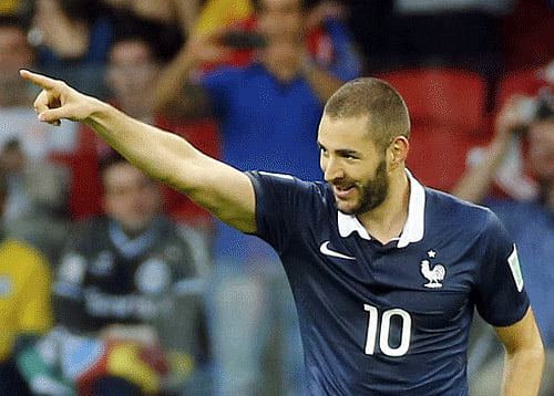 France's Karim Benzema celebrates scoring his third goal against Honduras during their 2014 World Cup Group E soccer match at the Beira-Rio stadium in Porto Alegre. Reuters photo