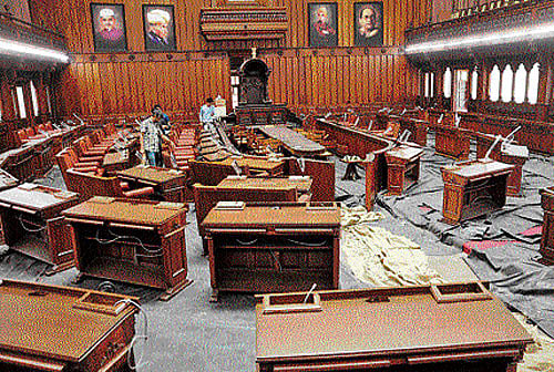 Makeover in progress: The final stage of renovation is in progress inside the Legislative Council Hall at the Vidhana Soudha in Bangalore on Monday. DH photo