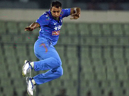 India's Stuart Binny jumps to celebrate the dismissal of Bangladesh's Mahmudullah during their second one-day International cricket match in Dhaka, Bangladesh. AP photo