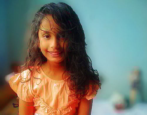 An eight-year-old girl was killed after her school bus ran over her head right in front of her house at Jyothinagar, in Chandra Layout, on Wednesday afternoon.  DH
