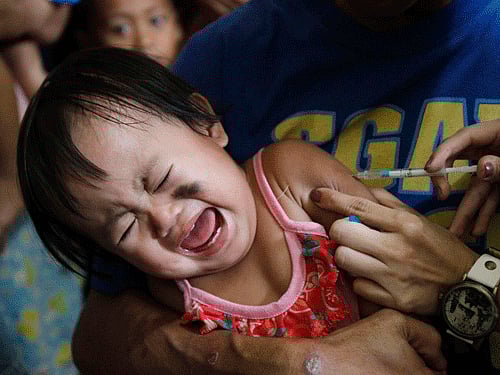 ''Immunization is a must for children for safeguarding them against all diseases, not only encephalitis,'' says Union Health Minister Harsh Vardhan. Reuters file photo for representation only