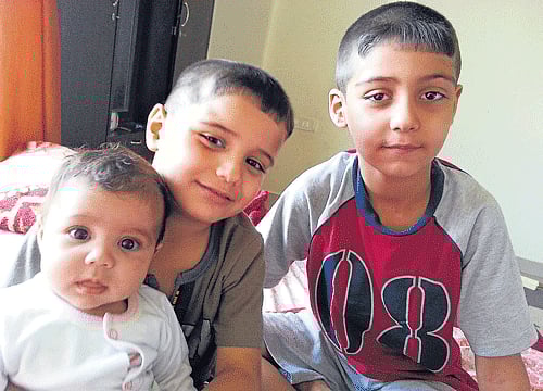 Comfortable: Hind (extreme left) with Ali and Zain. DH Photos by SK Dinesh