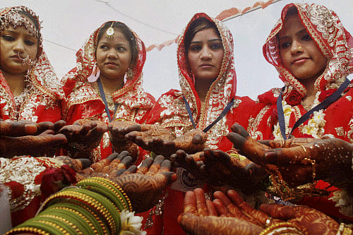 The government gave Rs 1 lakh each to as many as 27 muslim women, who got married while their families lived at the relief camps. Some muslim organisations had also chipped in and provided help in making other arrangements. PTI photo