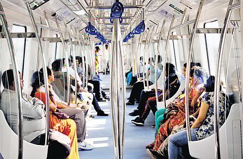 Mixed crowd : The reduction of announcements in Hindi has drawn varied reactions.