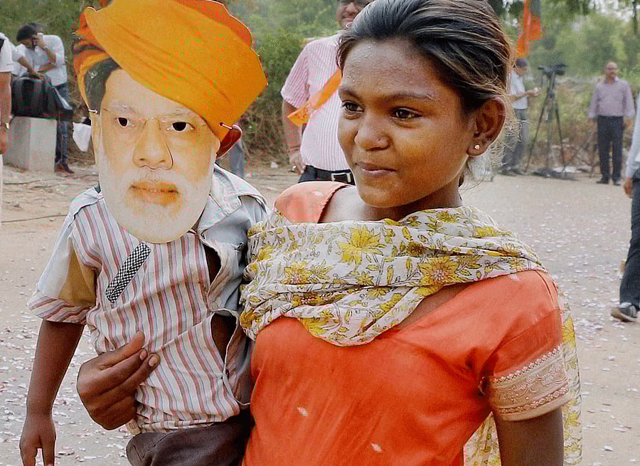 The BJP-led government is set to bring about a crucial change in the erstwhile UPA regime's flagship job scheme for villagers. PTI file photo