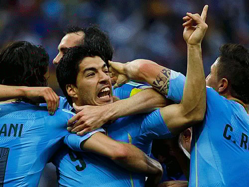 The sport's governing body suspended Suarez from all football-related activity for four months and ruled he could not play in Uruguay's next nine competitive games, meaning he is unlikely to appear in non-friendly matches for his country until 2016. Reuters photo