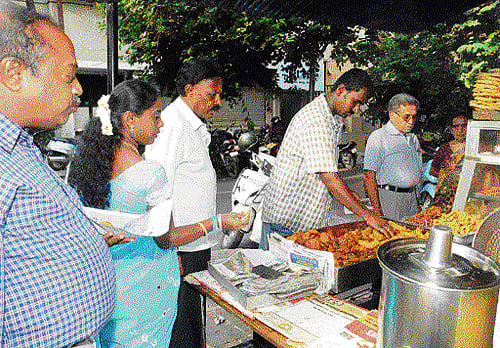 Brisk business: People throng the eatery at tea time. DH Photos by SK Dinesh