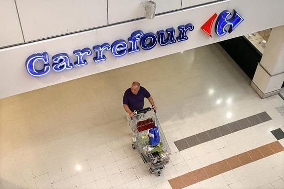 French retail giant Carrefour SA will shut down its Indian operations and close its wholesale stores in the country, as it exits underperforming markets to focus on reviving its French business. Reuters photo