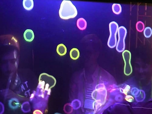 Scientists have developed a novel transparent see-through wall which can allow you to 'touch' the person on the other side. Screen grab