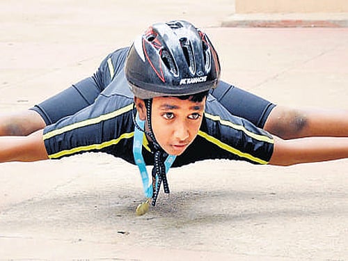 I R Medvin Deva was certified as the world's lowest limbo skater by the Guinness Book of Records. DHNS