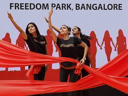 :Artists perform at a protest rally over the alleged rape of a six-year-old girl in a public school at the Freedom park in Begaluru on Sunday. PTI Photo