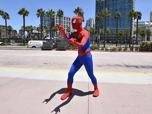 A 25-year-old man dressed as Spider-Man has been arrested after badgering a woman tourist for a tip in Times Square here and then punching a police officer in the face. AP photo. For representation purpose