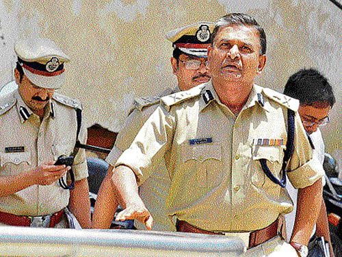 Police Commissioner M N Reddi arrives for a press conference at Commissioner's office in the City on Tuesday. DH photo
