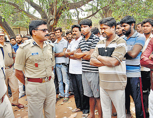 A senior police official probing the murder of a young woman, daughter-in-law of a leading businessman of Uttar Pradesh, was today taken off the investigation after he hugged the main accused and the victim's husband inside a police station here. DH file photo for representational purpose only