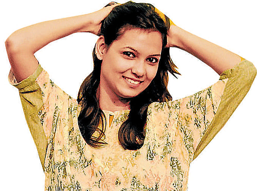 Navya H, final year BE, HKBK College of Engineering slipped into a pair of denim shorts and matched it with a light printed top