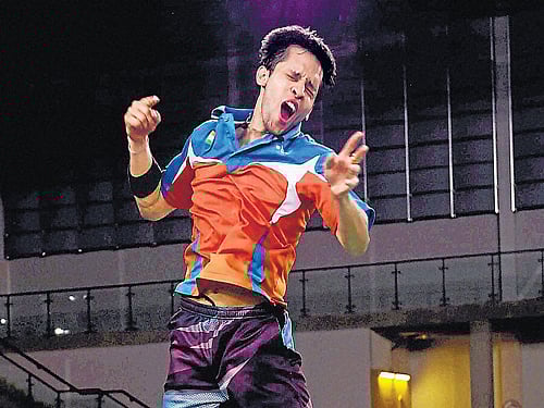 Parupalli Kashyap celebrates his triumph after winning the men's singles gold in badminton. PTI