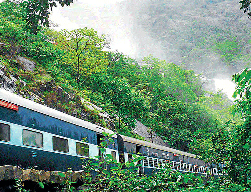 Atrainmoving in Braganza Ghat section. PHOTOS BY SWR