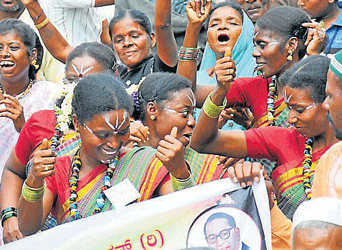 Tribal artistes perform during the World Tribal Day celebrations, held in Mysore, on Saturday.DH PHOTOS