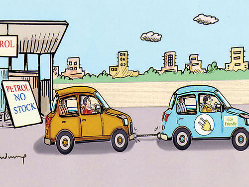Cartoonist B V Panduranga Rao's cartoon (above) depicts a car driven by battery power pulling the petrol car.