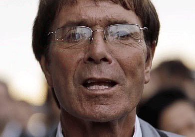 Singer Cliff Richard may be forced to miss his annual trip to the US for the Open Tennis after allegations of sexual assault. AP photo