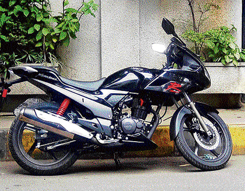 Black beauty: As far as looks go, the Karizma has undergone a complete makeover, from head to extended tail lamp. The bike now comes with wider tubeless tyres, a first for the Karizma variant. The new windshield also contributes to a good ride. DH PHOTOS BY pavan nagasampagi