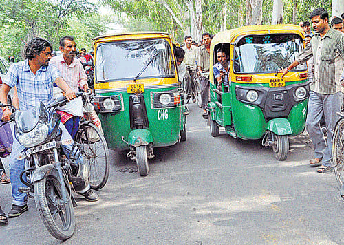 People gather at the encounter site. DH photo