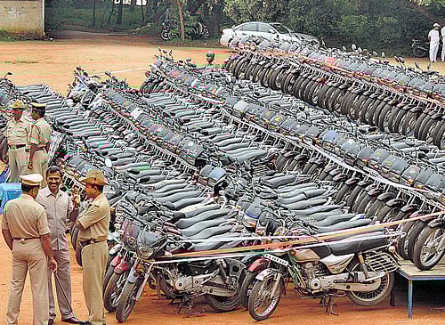 large haul: As many as 200 two-wheelers recovered by the west division police are kept at the property parade in Bangalore on Wednesday. DH PHOTO