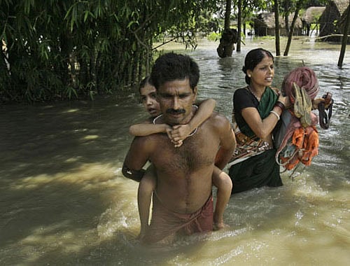 With water rising to an alarming level at the Dowleswaram barrage in East Godavari district of Andhra Pradesh, the second warning flag was hoisted in the area, a senior irrigation officials said here today. AP photo for  representation only