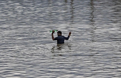 Fourteen children who died at a hospital here are among the 43 people found dead in the Kashmir Valley as the flood waters receded in Jammu and Kashmir, authorities said Saturday. Reuters photo
