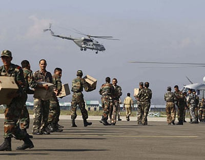Even as the men in uniform continue their relentless efforts to provide succour to flood victims in the Kashmir Valley, their aircraft and boats are being targeted by stone pelters. Reuters photo