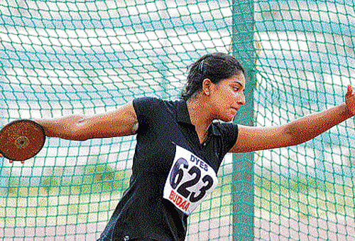 milestone: Dakshina Kannada's JS Priyanka created a new meet record in the under-20 girls discus throw at the State Junior and Senior Athletic Championships. dh photo