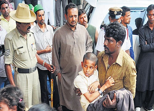 More than 350 students were hospitalised as they complained of nausea and stomach ache after eating midday meals at the Government Urdu Model Higher Primary School at DJ Halli here on Friday. DH photo