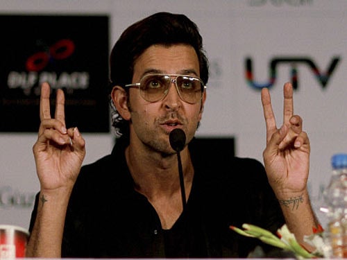 Hrithik Roshan is promoting his upcoming film 'Bang Bang' in an innovative way on Twitter by daring Bollywood stars including Shah Rukh Khan, to take on fitness challenges. PTI file photo