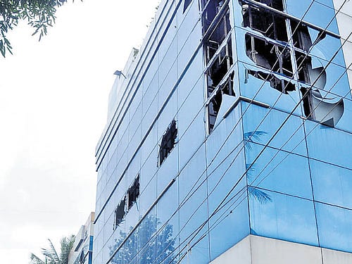 Five fire tenders doused a minor blaze that broke out on the third floor of a building in Madiwala Tuesday. DH photo