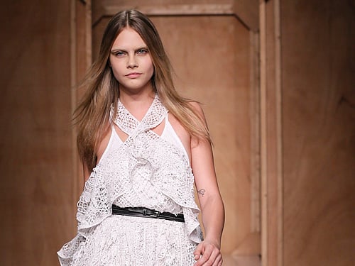 Model Cara Delevingne presents a creation by Italian designer Riccardo Tisci as part of his Spring/Summer 2015 women's ready-to-wear collection for fashion house Givenchy during Paris Fashion Week. Reuters photo