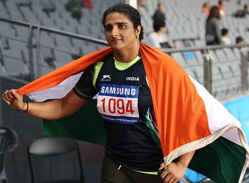 India's Seema Punia's celebrates after winning the gold medal in women's discus throw final at the 17th Asian Games in Incheon, AP photo