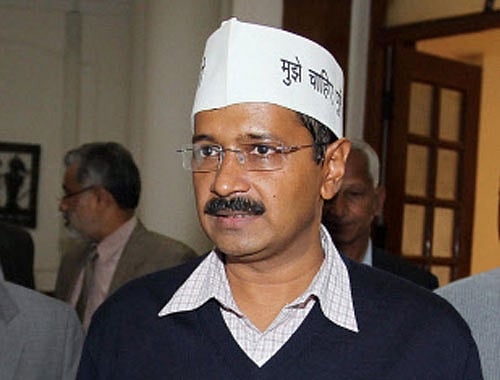 AAP chief Arvind Kejriwal Thursday helped sweepers to clean up choked drains in a small residential area near Prime Minister Narendra Modi's residence in the heart of the capital. PTI file photo