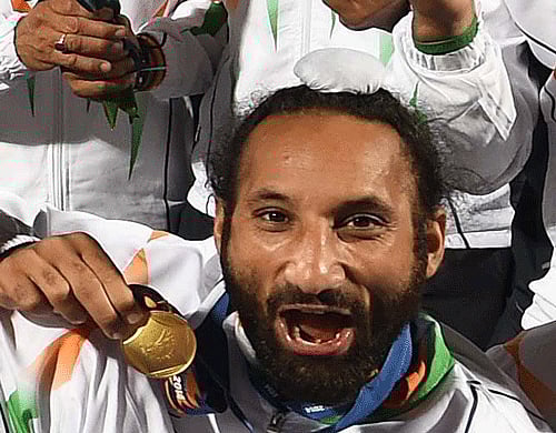 The Indian men's hockey team returned home on Sunday from Incheon to a heroes' welcome, with fans turning out in large numbers to receive the Asian Games champions. / PTI Photo