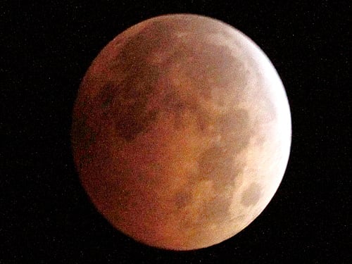 Stargazers in the Americas and Asia will be treated to a lunar eclipse today, a celestial show that will bathe the moon in red to create a blood moon. AP Photo