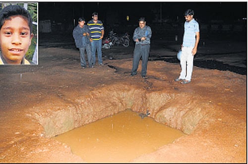Tragedy revisits: Yeshvanth (inset) drowned in a pit dug for construction purpose on the premises of Government Arts and Science College on Wednesday afternoon. DH PHOTO